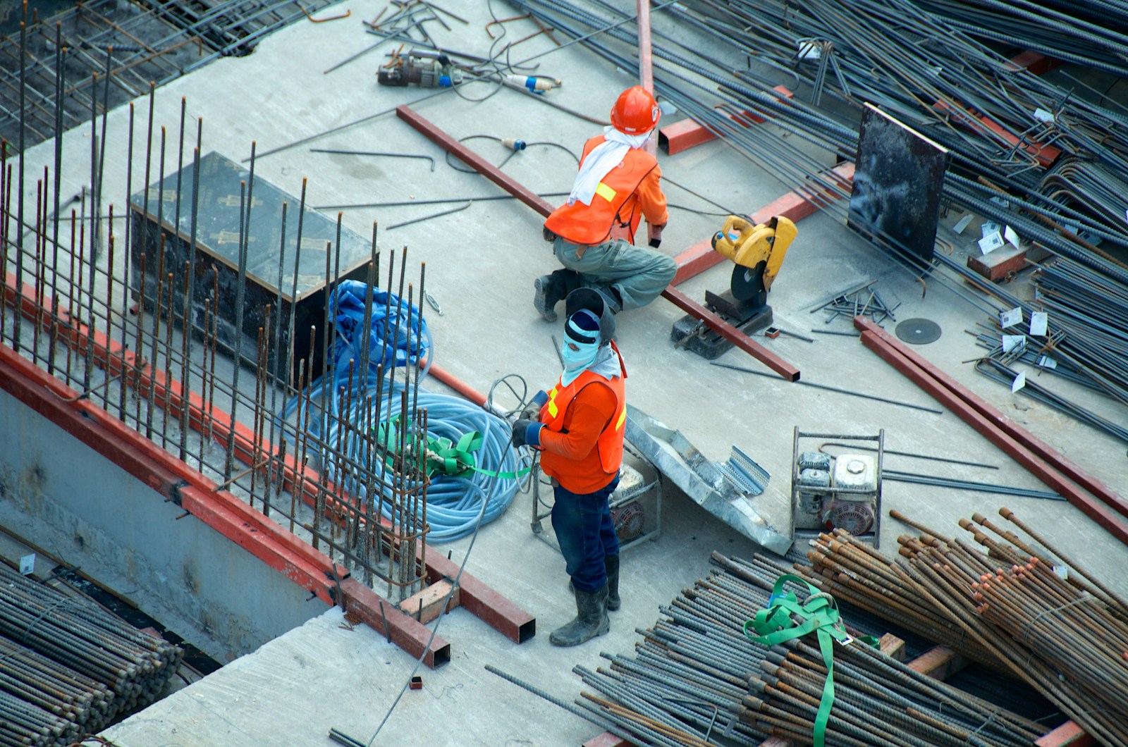 two men working, builders risk